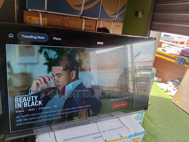 “Go Big With TCL – The Ultimate 55” Smart Tv Experience!” · Photo 1