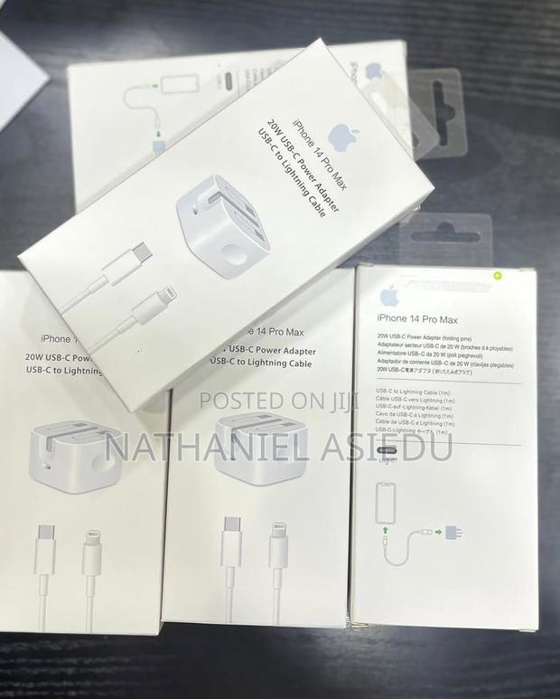 Apple 60w Usb-C Power Adapter and a Usb-C to Lightning Cable · Photo 1