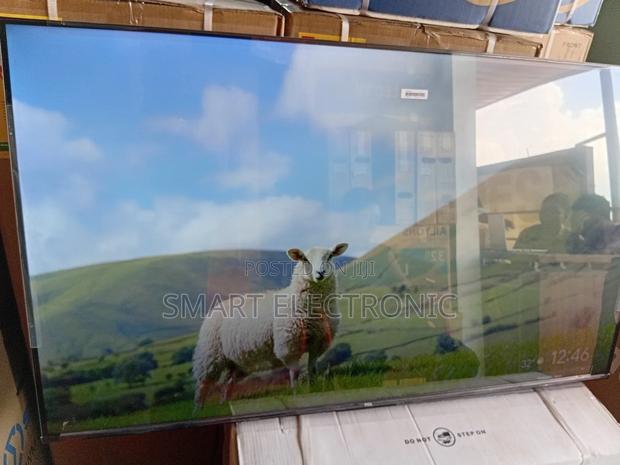 TCL 65-Inch Uhd Smart Tv With Dolby Vision Hdr10+ · Photo 1