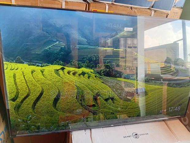 TCL 65-Inch Uhd Smart Tv With Dolby Vision Hdr10+ · Photo 2