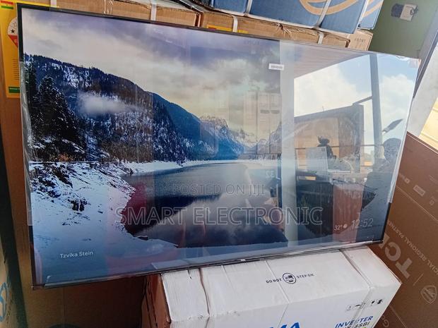 8. TCL 65” Smart Tv With Voice Control Built-in Chromecast · Photo 1