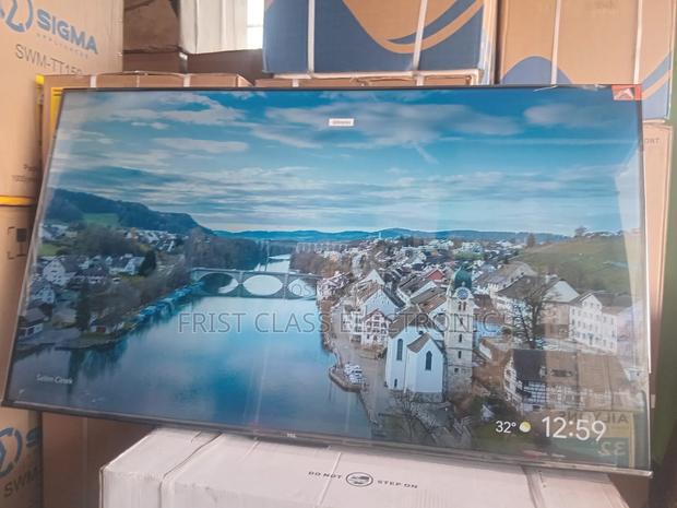 Home Happiness Comes With TCL Digital Uhd TCL Tv · Photo 2