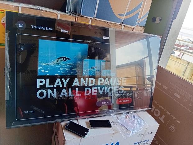11. “Upgrade Your Viewing Experience With TCL 65-Inch Smart Tv ” · Photo 1