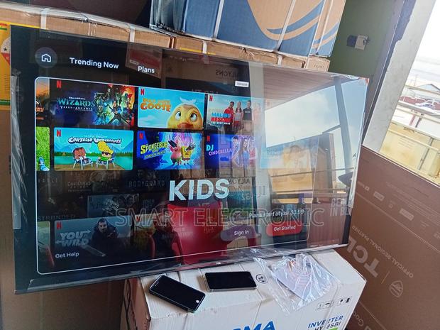 12. “Go Big With Tcl! 65-Inch Smart Tv on Sale Now!” · Photo 1