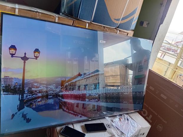 14. “Transform Movie Nights With Tcl’S 65-Inch Qled Tv ” · Photo 2