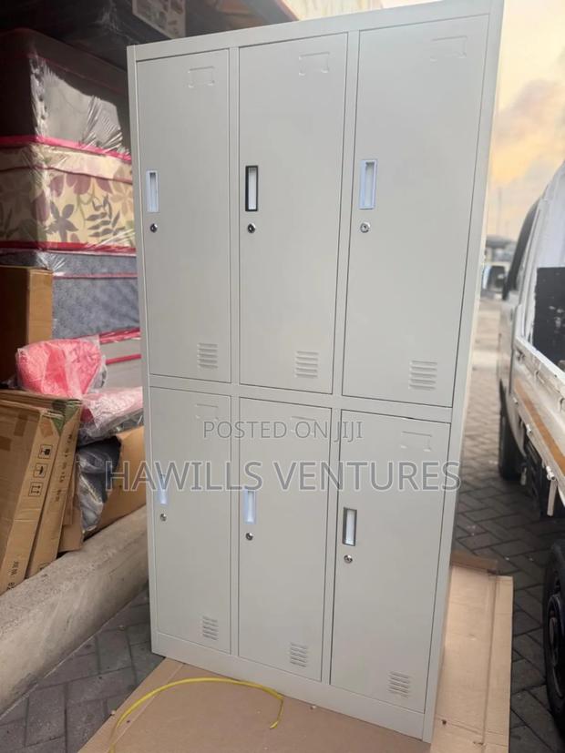 Six Door Metal Locker Cabinet · Photo 1
