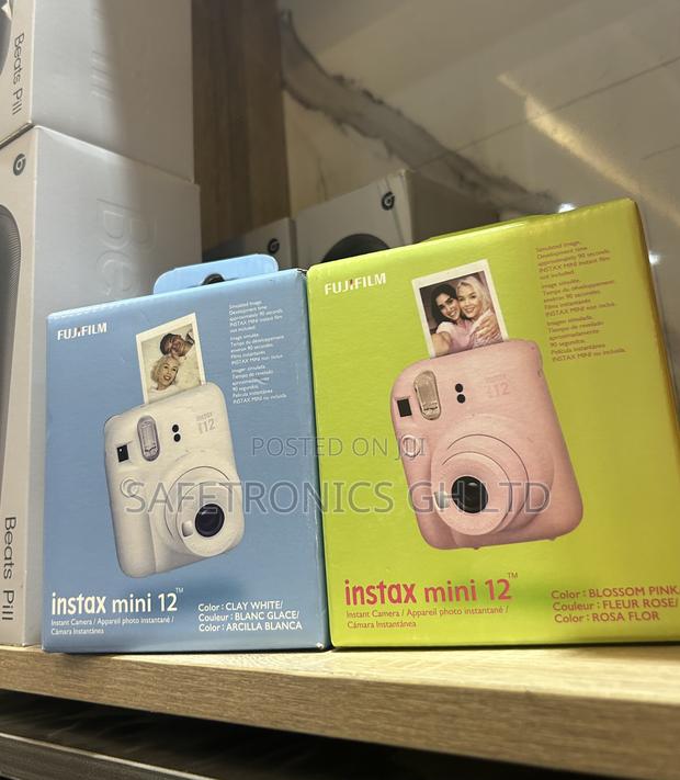 Lastest Fujifilm Instax Cam Mini 12 ___ Film Instant Camera • · Photo 1