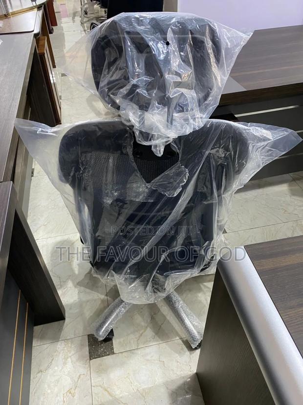 An Authentic Swivel Chair With Head · Photo 2