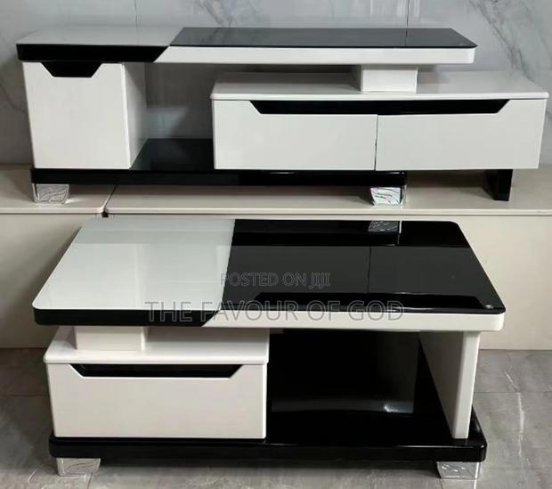 A Stunning Glass Center Table With Tv Stand · Photo 1