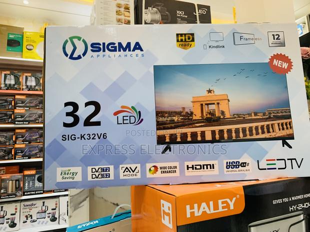 Grab Your Favorite Sig-K32v6. 32” FHD Satellite Digital Television · Photo 1