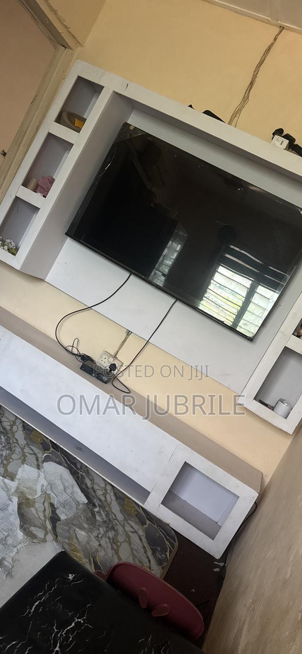 Affordable Home Used TV Stand · Photo 1
