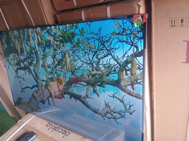 Smart, Sleek, and Powerful — TCL 55” Smart Tv for Your Home. · Photo 1