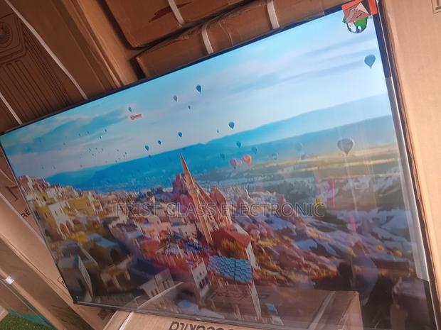 The Perfect Mix of Style and Performance — TCL 55” Smart Tv. · Photo 1