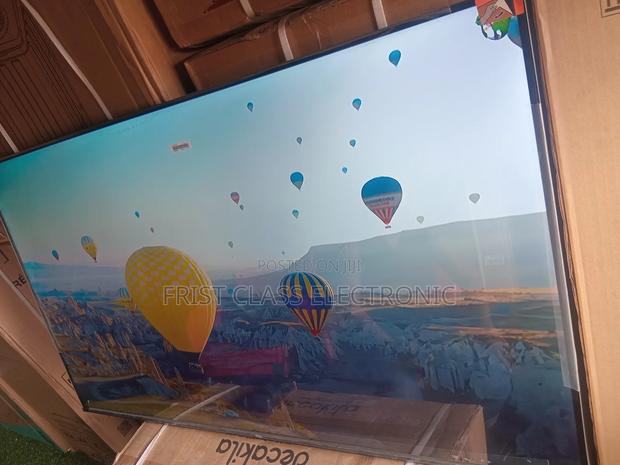 Big Screen Entertainment Made Affordable by TCL Digital Uhd TCL Tv · Photo 1