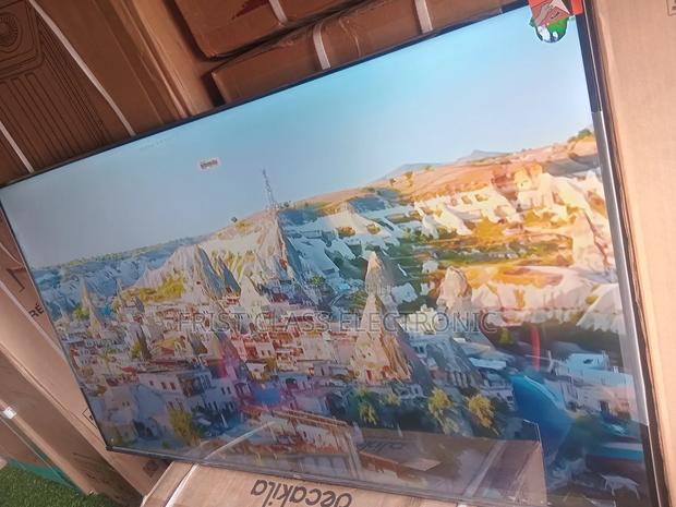 Big Screen Entertainment Made Affordable by TCL Digital Uhd TCL Tv · Photo 2