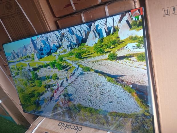 Real Visuals for Real Excitement — TCL 55” Smart Tv. · Photo 1