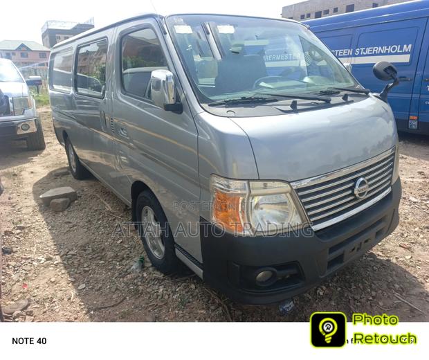 Nissan Caravan (Urvan) 2010 Grey · Photo 1