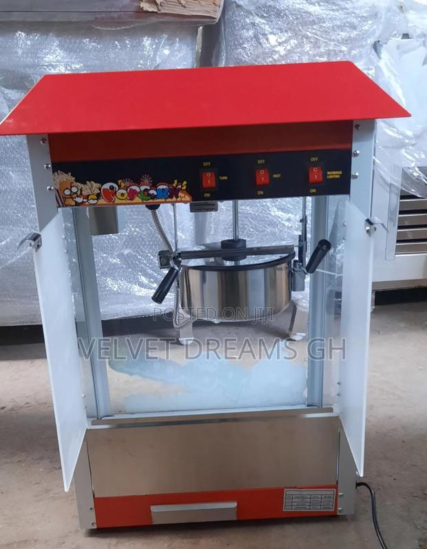 High-Performance Popcorn Machine With Warmer. · Photo 1