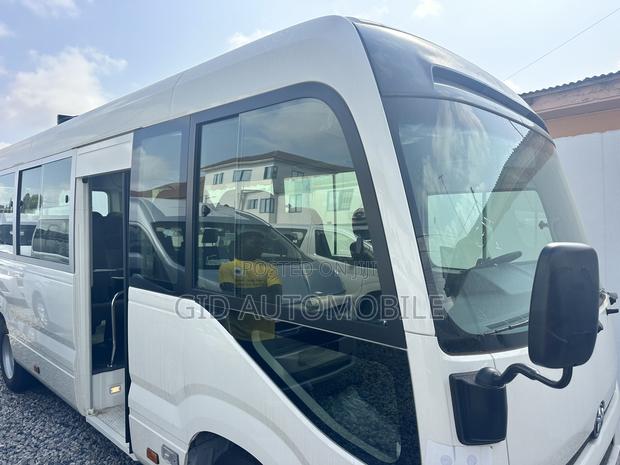 New Toyota Coaster 2025 Grey · Photo 3