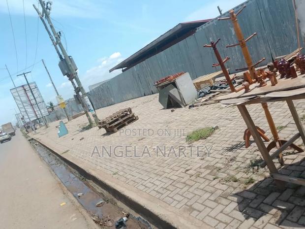 Main Roadside Land at Ajiriganor-East Legon Highway · Photo 1