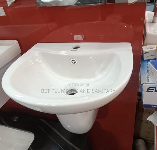 Wall Hung Wash Hand Basin_basin and Short Stand or Pedestal · Photo 1