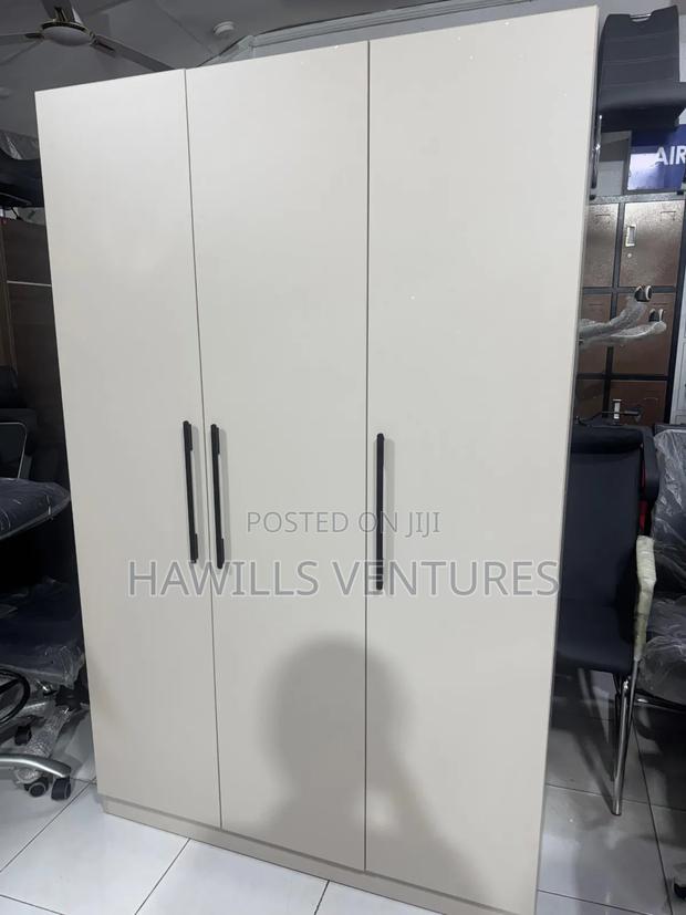 Three - Door Wardrobe With Shelving · Photo 1