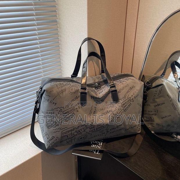 Mini Canvas Duffel Bag · Photo 1