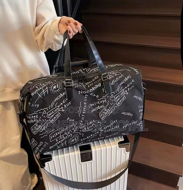 Mini Canvas Duffel Bag · Photo 4