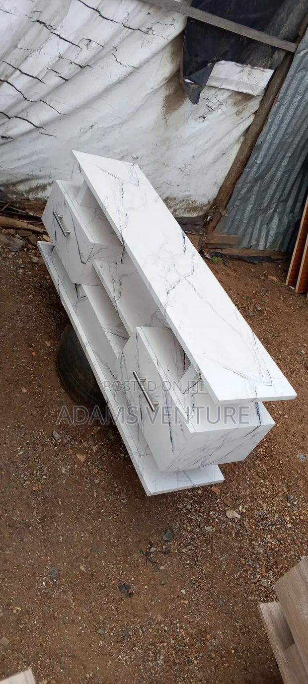 Nice Whit 4feet TV Stand for Sell · Photo 1