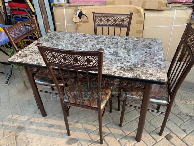 Set of Dining Table With 4 Chairs · Photo 1