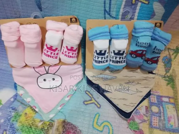 Bibs and Socks 0 to 9months ( Price Per Pack) · Photo 1