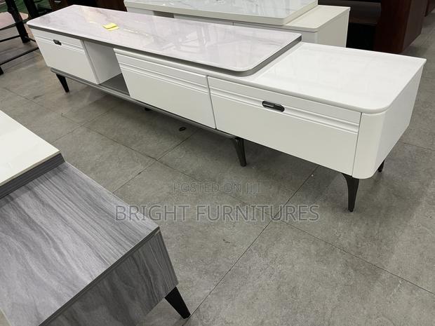 Adjustable Wooden Tv Stand With Drawers · Photo 2