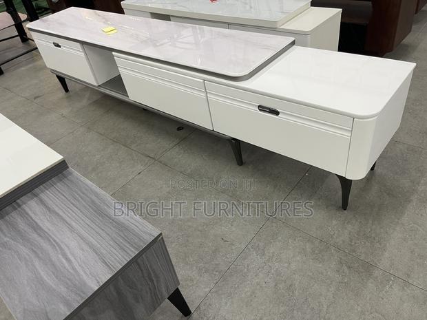 Adjustable Wooden Tv Stand With Drawers · Photo 1