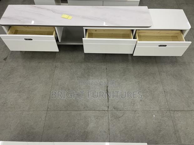 Adjustable Wooden Tv Stand With Drawers · Photo 3