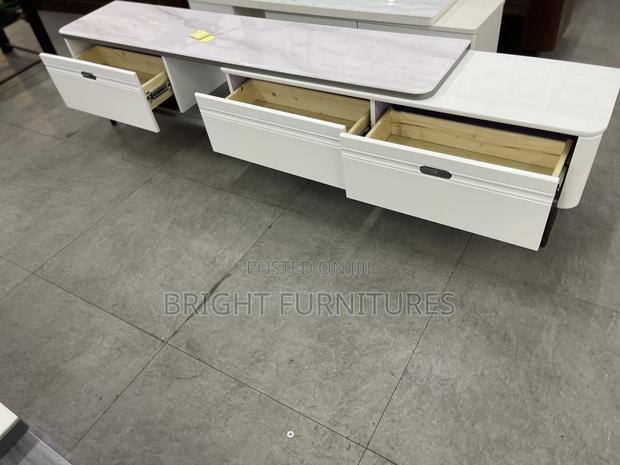 Adjustable Wooden Tv Stand With Drawers · Photo 5