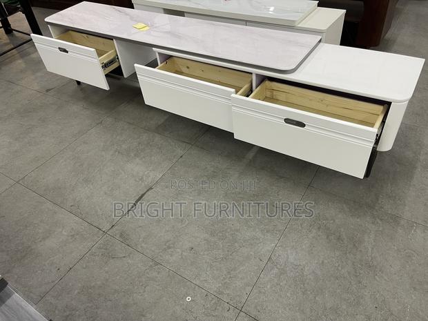 Adjustable Wooden Tv Stand With Drawers · Photo 4