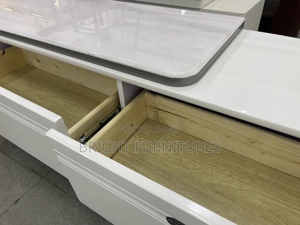Adjustable Wooden Tv Stand With Drawers · Photo 6