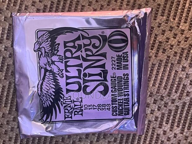 Ernie Ball Ultra Slinky Electric Guitar Strings. · Photo 1
