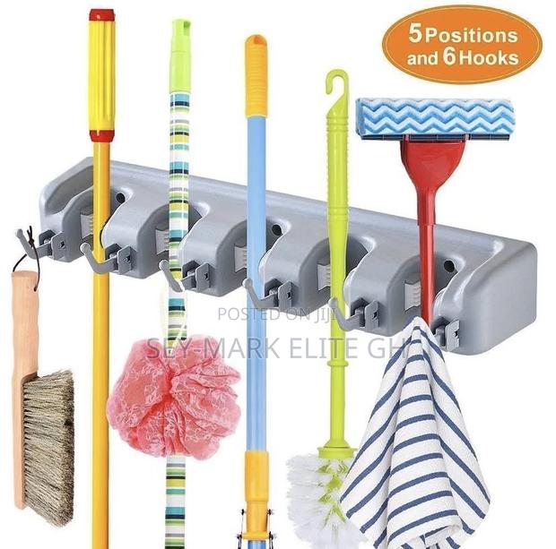 Broom Mop Sticks Holder · Photo 3
