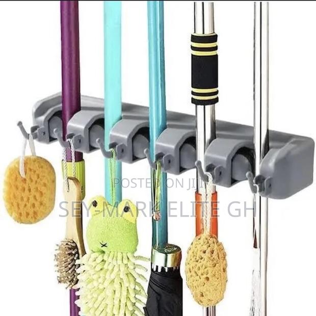Broom Mop Sticks Holder · Photo 2
