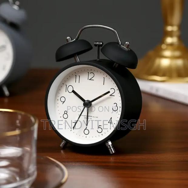Beside Retro Quartz Alarm Clock · Photo 1