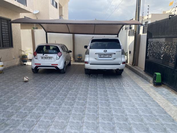 Free Roll Car Canopies · Photo 2