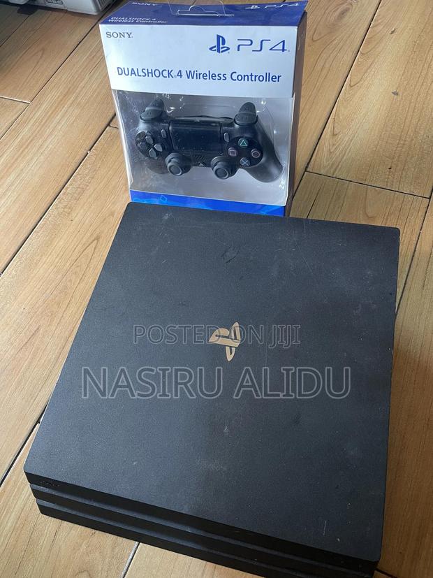 Ps4 Pro With 10-15 Good Games Two Controllers . From Home Use · Photo 5