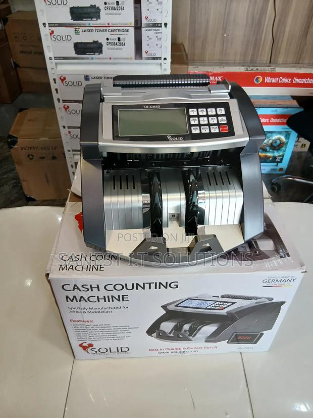 Money Counting Machine With Counterfeit Detection · Photo 1