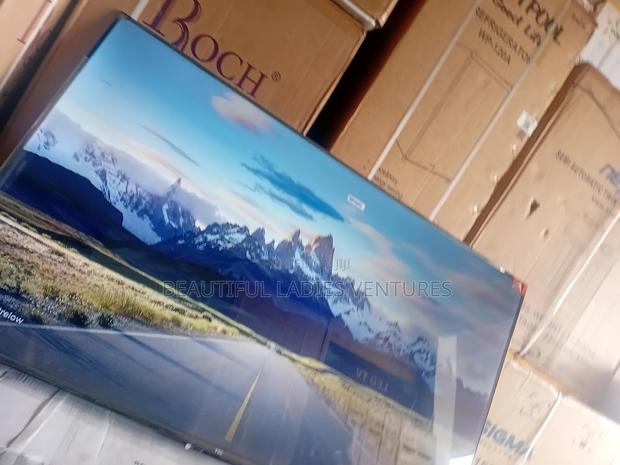 Modern 55-Inch Smart Tv – Perfect for Family Entertainment · Photo 1