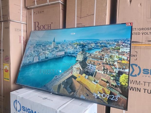 TCL 55” Uhd Smart – The Ultimate Viewing Experience · Photo 1