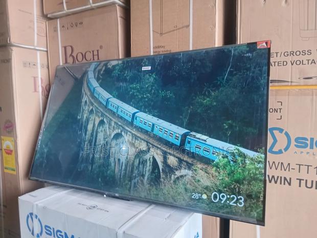 TCL 55” Smart Uhd Tv – Clear, Bright Beautiful · Photo 1