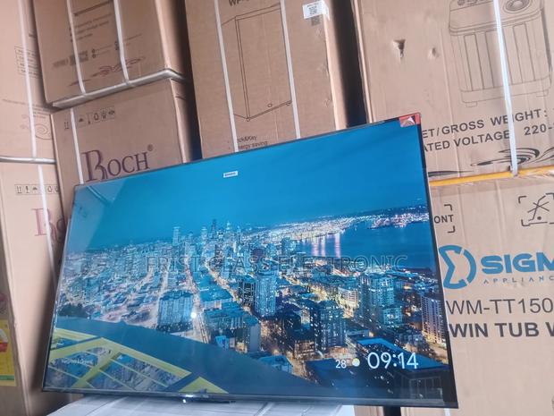 TCL 55” Uhd Tv – Smart Control, Smart Look · Photo 2