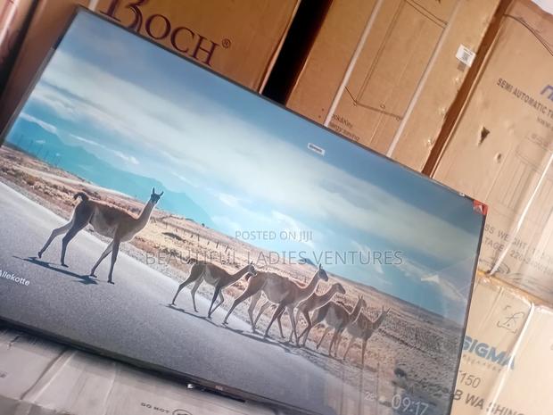 Perfectly Designed 55-Inch Tv – Sleek and Stunning Display · Photo 1