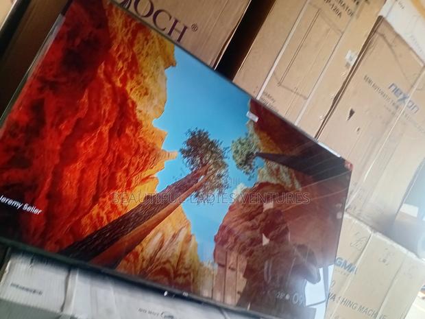Perfectly Designed 55-Inch Tv – Sleek and Stunning Display · Photo 2